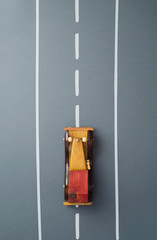 Vintage wooden toy car and a road doodle