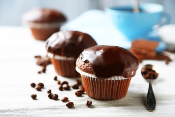 Tasty homemade chocolate muffins and cup of coffee