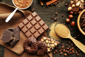 Still life with set of chocolate, nuts and spices