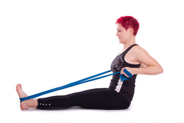 Übung mit dem Theraband, Arme anziehen