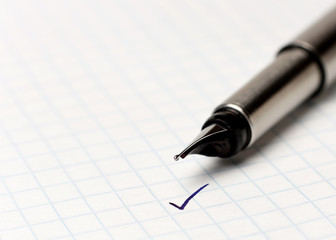 Fototapeta premium X, which has set fountain pen. Focus on the tip of the pen.