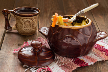 Roast in a pot with chicken and vegetables