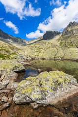 Stones in alpine lake in summer, Tatra Mountains, Slovakia
