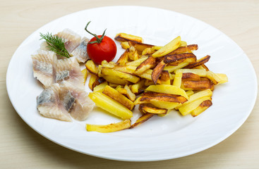 Roasted potato with herring fillet