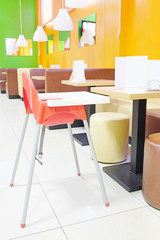 Empty baby chair in the restaurant