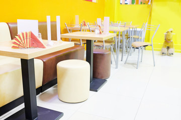 Modern restaurant interior with leather sofas