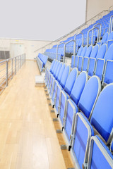 Naklejka premium Blue stadium seats hall handball