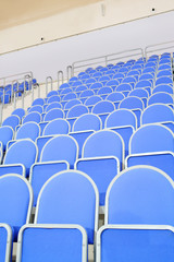 Obraz premium Blue stadium seats hall handball