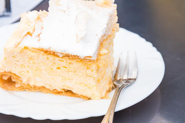 Original delicious Croatian pastry kremsnita from Samobor on a p