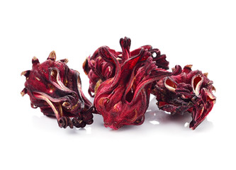 dried hibiscus sabdariffa or roselle fruits on white. © nipaporn
