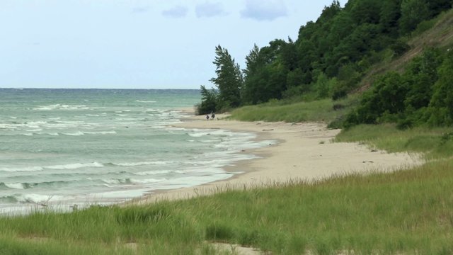 Long lens view of a beach on Lake Michigan, USA.