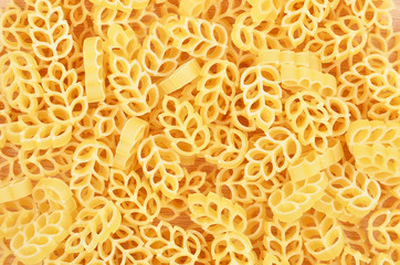 Close up of wheat shaped pasta as background