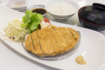 Tonkatsu - Japanese breaded deep fried pork cutlet with steamed
