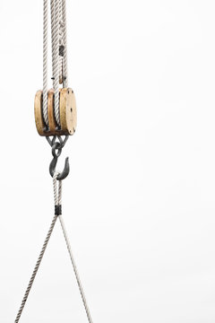 Fototapeta Sailboat pulley rope and hook detail close up. Copy space
