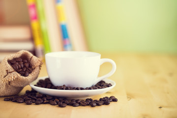 Coffee cup on the table - vintage style effect picture