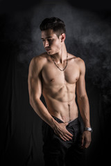 Fototapeta na wymiar Handsome shirtless muscular young man's profile
