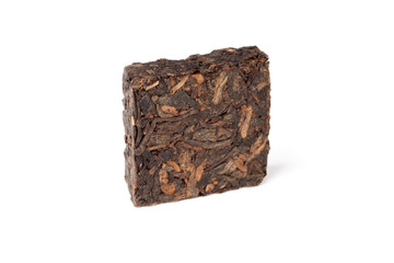 Square briquette of black Chinese Shu Pu-erh tea isolated