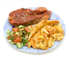 fried salmon and potatoes with fresh vegetable salade