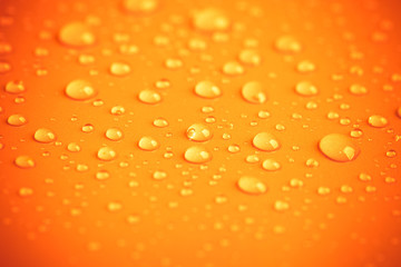 Drops of water on a color background. Shallow depth of field. To
