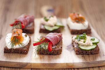 Delicious little sandwiches with tuna, cheese, prosciutto and ve