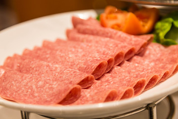 Sliced Salami on Plate