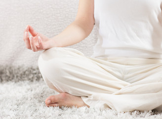 Fototapeta na wymiar Yoga Woman Meditating Relaxing Healthy Lifestyle