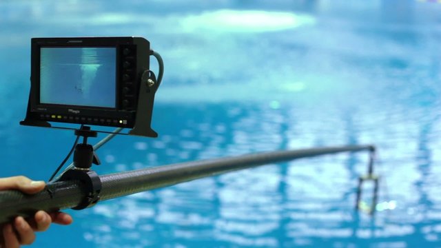 Camera with monitor which displays water jump of sportsman