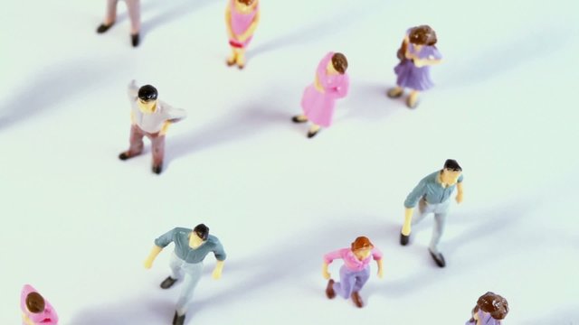 Toy, miniature figures of human in costumes spins