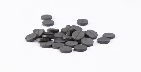 stack of activated carbon on white background