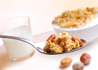 Spoon with muesli and nuts