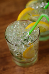 Lemonade with fresh lemon and mint by lemon reamer