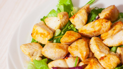 Vegetable salad with roasted chicken meat