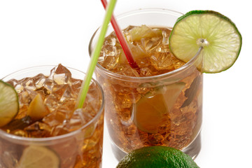 Fresh Fresh cocktail with cola drink and lime fruit