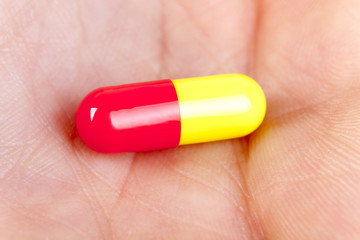 capsule pills lies on the hand