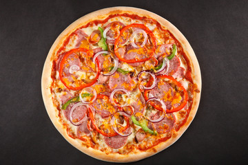 Tasty Italian pizza with pepper onion salami - 80131845