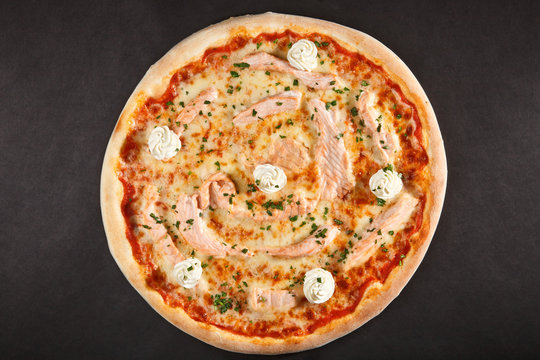 Tasty Italian pizza wit seafood salmon and cheese pheeladelphia