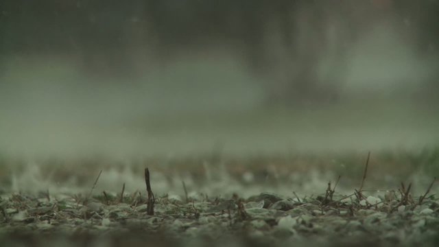 Rain drops hitting the ground during a big storm.  Three clips, recorded in slow motion at 60fps.