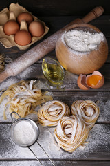 Fototapeta na wymiar Raw homemade pasta and ingredients for pasta