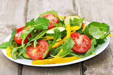 Vegetable salad on rustic table