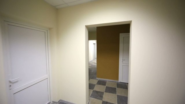 Entrance to new residential house, empty corridors, mailboxes.