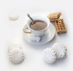 Tea with waffles and marshmallows