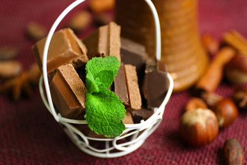 Still life with set of chocolate, spices and nuts
