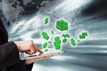 Business woman are checking exchange rates by using digital tabl