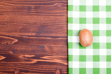 delicious ripe kiwi on the board with a napkin