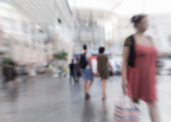 Blurred people walking in the shopping mall