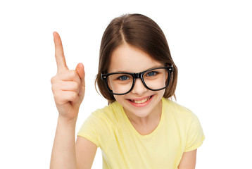 smiling little girl in eyeglasses