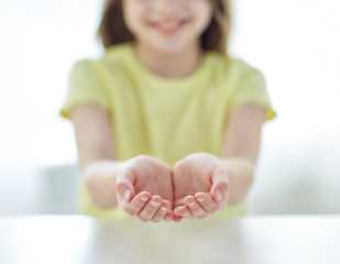 close up of child cupped hands