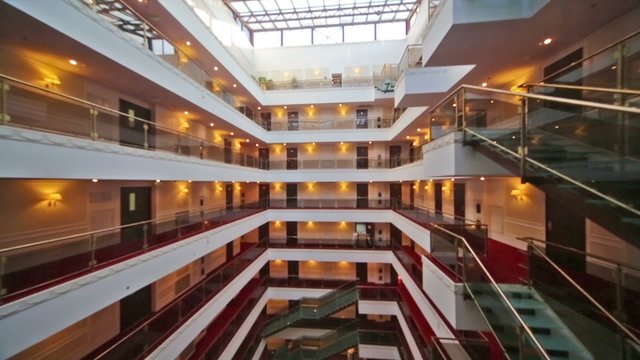 View from downward movement elevator to floors with balconies