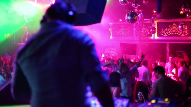 People dance in night club during DJ Solovey birthday party