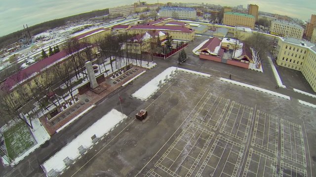 Army garrison with plateau near barracks at winter day